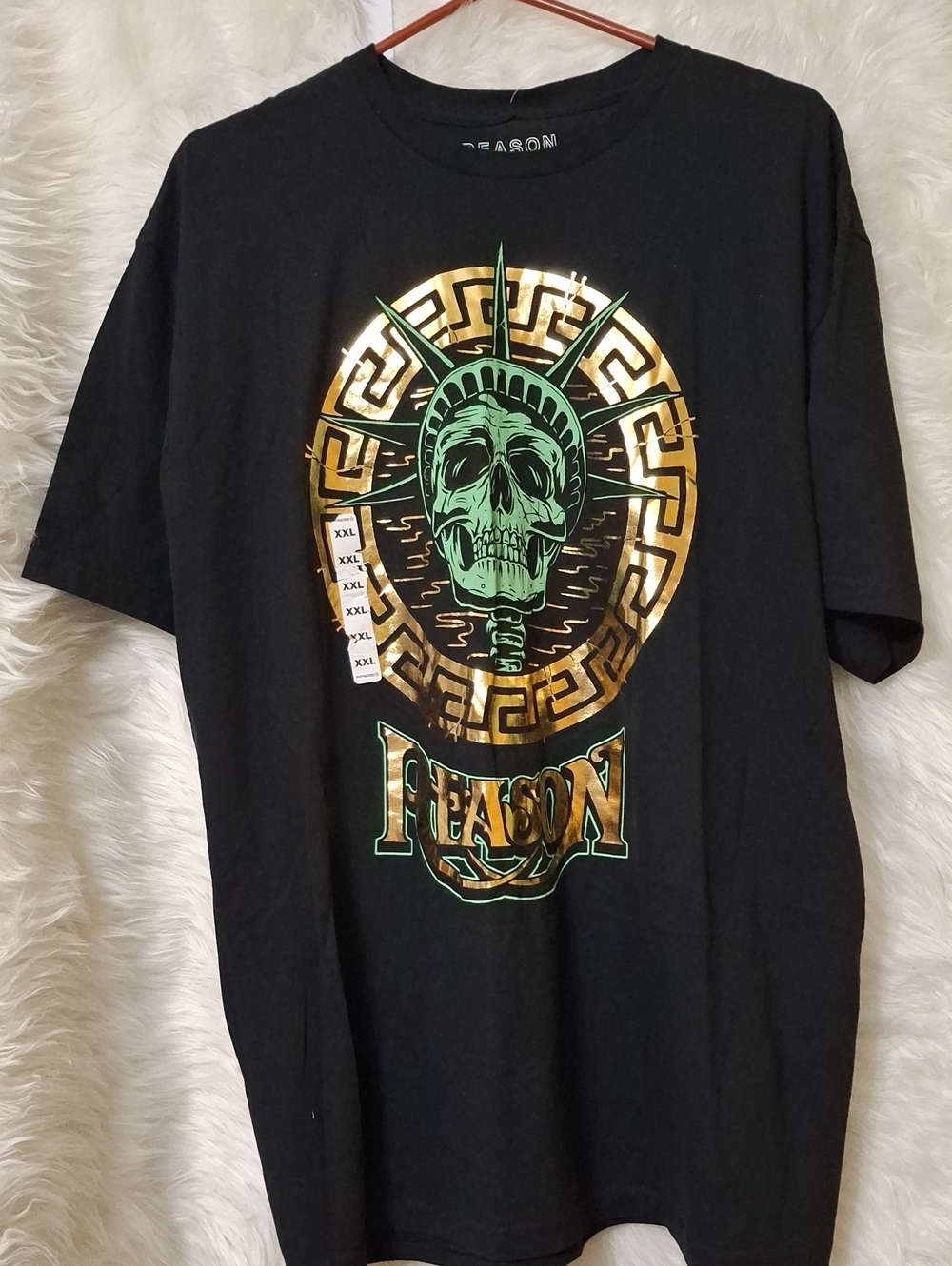 Reason Black Short-Sleeve Tee with Green & Gold Statue Skull Graphic